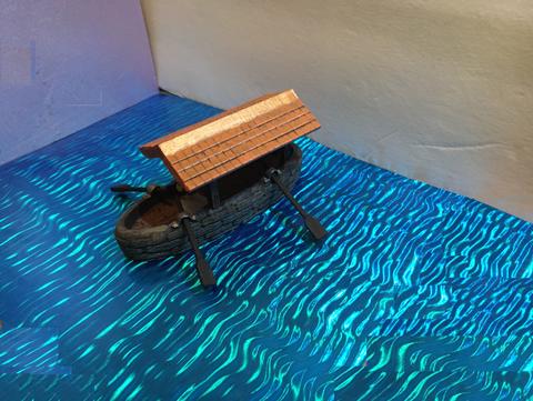 Image of Miniature Covered Boat with Oars