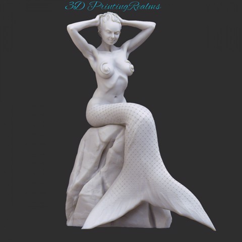 Image of Mermaid sitting on rock  NSFW